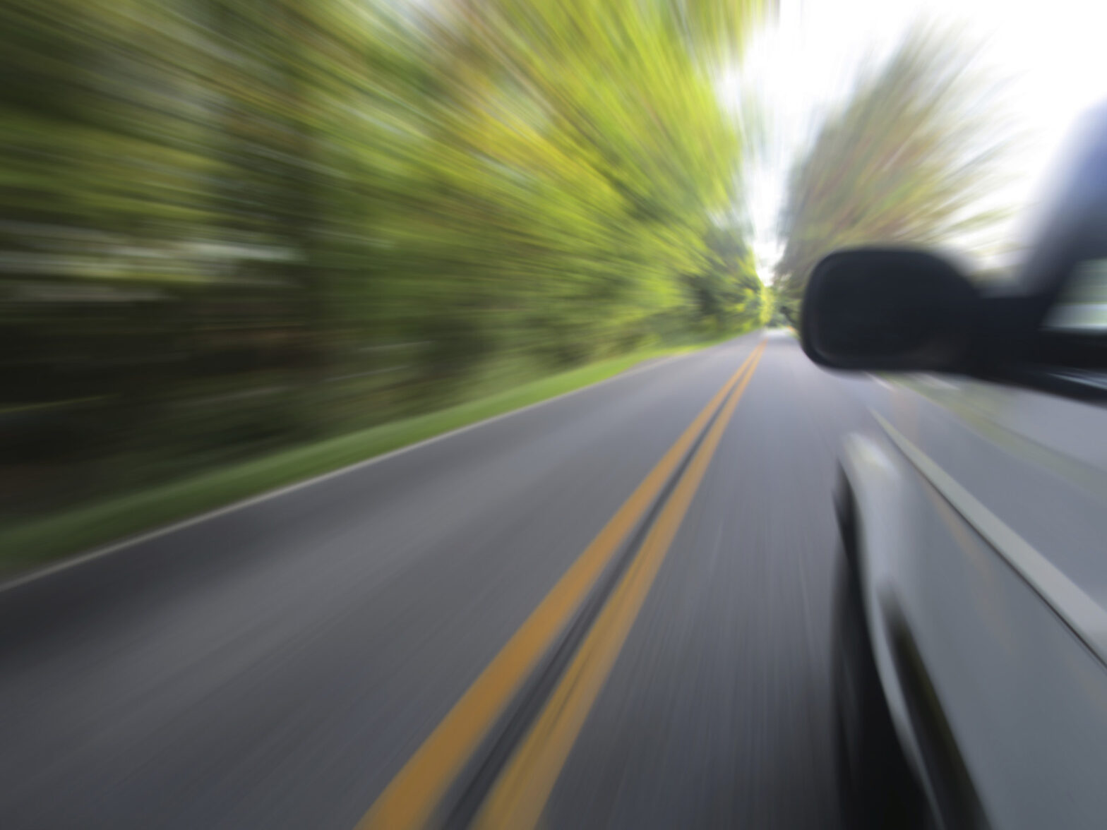 A car speeding down the road - Communicating Culture Down the Line