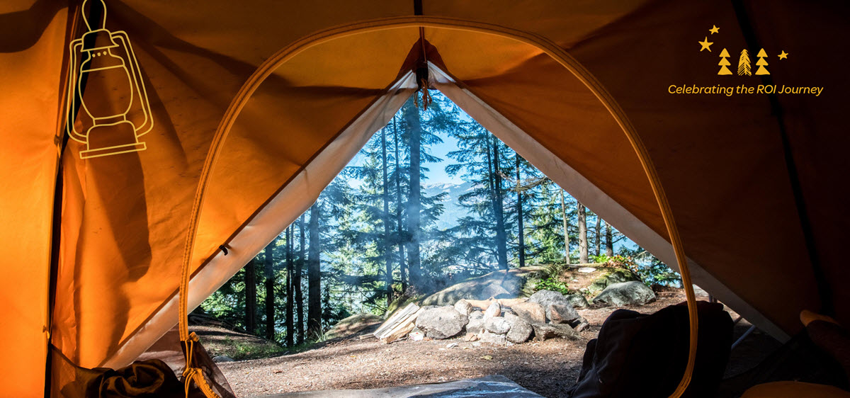 A zoom background with an image of an open tent with a view of forest trees